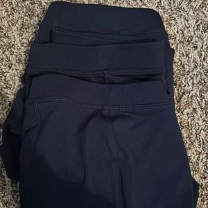 three pairs navy varsity spanks